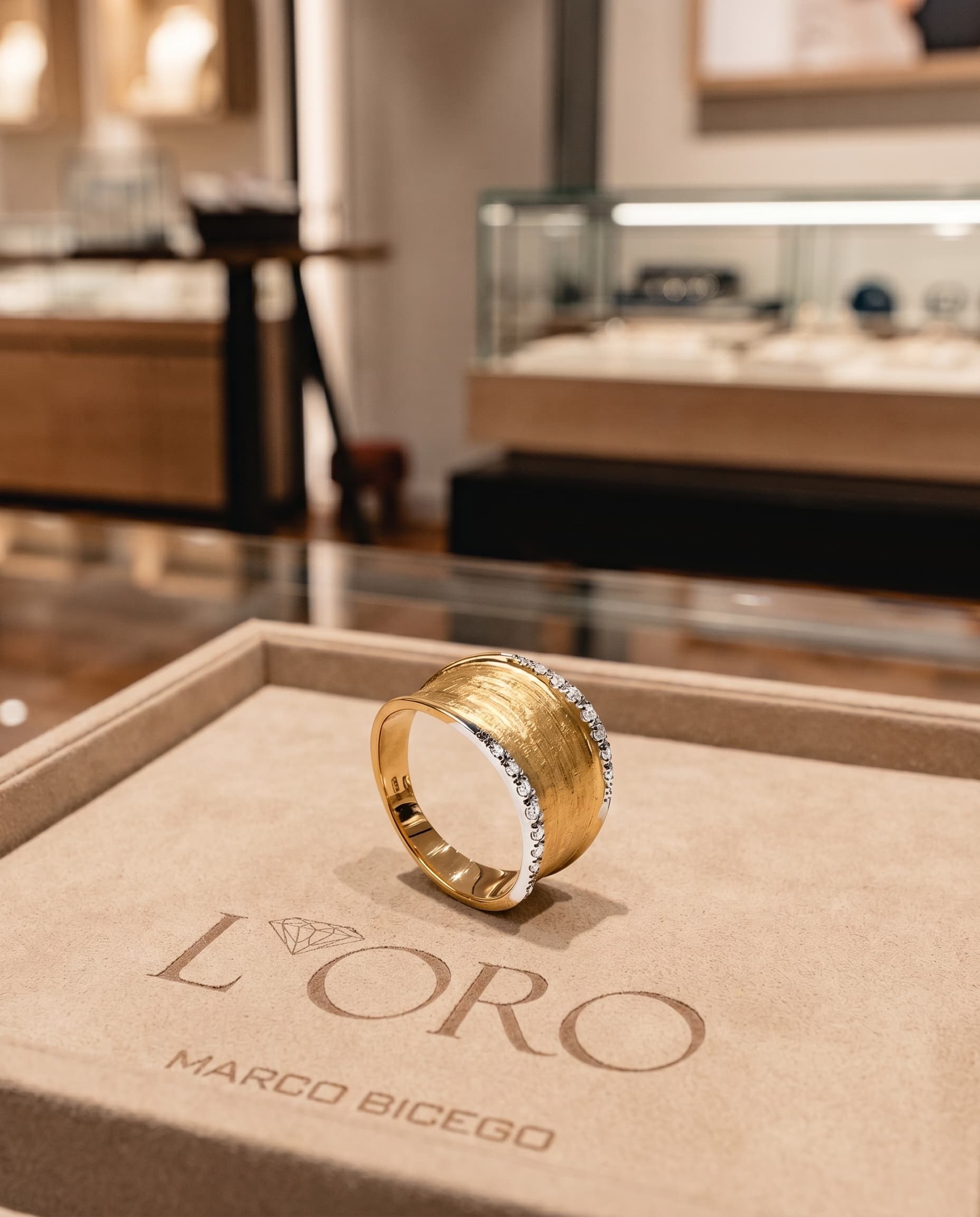 Marco Bicego yellow gold and diamond ring on a branded boutique presentation box
