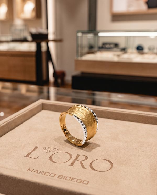 Marco Bicego yellow gold and diamond ring on a branded boutique box